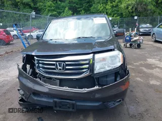 2012 Honda Pilot EX-L z VIN 5FNYF4H79CB026760, wystawiony jako IAAI lot #42277545 z przebiegiem 154 148 mil mil oraz . Historia ofert i sprzedaży dostępna na DreamBid. Obrazek 12.