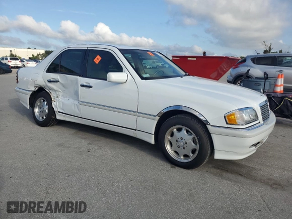 1999 Mercedes-Benz C 230/260/280/320 with VIN WDBHA24G5XA780454, listed as a Copart auction lot 73794674 with 90,578 mi miles and Salvage Title. Bid and sale history available at carsss.com. Image 4.