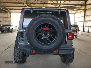 2022 Jeep Wrangler Unlimited High Tide with VIN 1C4HJXDG2NW221829, listed as a Copart auction lot 64836074 with 3,394 mi miles and Salvage Title. Bid and sale history available at DreamBid. Image 6.