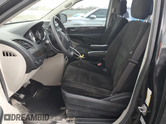 2015 Dodge Grand Caravan SE with VIN 2C4RDGBGXFR744203, listed as a Copart auction lot 54791795 with 216,594 mi miles and Clean Title. Bid and sale history available at DreamBid. Image 7.