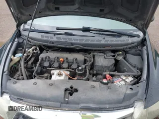 2009 Honda Civic LX z VIN 1HGFA16599L005064, wystawiony jako IAAI lot #42395387 z przebiegiem 297 398 mil mil oraz . Historia ofert i sprzedaży dostępna na DreamBid. Obrazek 10.