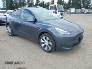 2021 Tesla Model Y Standard Range z VIN 5YJYGDED5MF109384, wystawiony jako IAAI lot #42245479 z przebiegiem 3592 mil mil oraz . Historia ofert i sprzedaży dostępna na DreamBid. Obrazek 1.