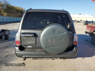 2005 Suzuki XL7 LX z VIN JS3TY92V554107839, wystawiony jako Copart lot #88328455 z przebiegiem 122 912 mil mil oraz Szkoda całkowita • Salvage title. Historia ofert i sprzedaży dostępna na DreamBid. Obrazek 6.
