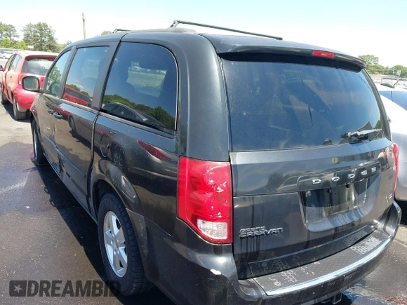 2012 Dodge Grand Caravan SXT with VIN 2C4RDGCG8CR247824, listed as a IAAI auction lot 42210397 with 200,919 mi miles and . Bid and sale history available at DreamBid. Image 3.