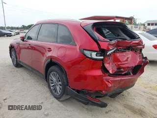 2024 Mazda CX-90 Preferred with VIN JM3KKBHDXR1114186, listed as a IAAI auction lot 41877143 with 29,500 mi miles and . Bid and sale history available at DreamBid. Image 3.