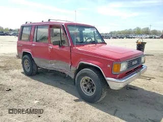 1990 Isuzu Trooper z VIN JACCH58R7L8917768, wystawiony jako Copart lot #45875835 z przebiegiem 230 130 mil mil oraz Szkody całkowita. Historia ofert i sprzedaży dostępna na DreamBid. Obrazek 11.