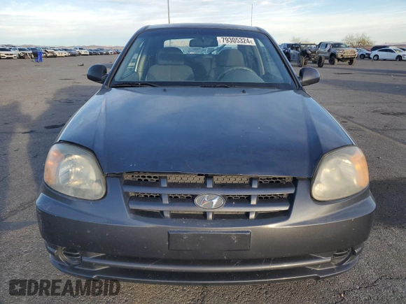 2005 Hyundai Accent GLS with VIN KMHCG35C65U359247, listed as a Copart auction lot 79305324 with 120,985 mi miles and Salvage Title. Bid and sale history available at carsss.com. Image 5.