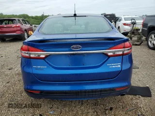 2017 Ford Fusion Hybrid Titanium with VIN 3FA6P0RU1HR138725, listed as a Copart auction lot 56650625 with 77,331 mi miles and Salvage title. Bid and sale history available at DreamBid. Image 6.