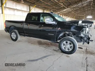2023 Ram 2500 Laramie with VIN 3C6UR5FL4PG580565, listed as a Copart auction lot 42385155 with 13,939 mi miles and Salvage Title. Bid and sale history available at carsss.com. Image 4.