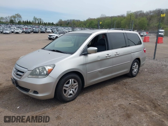 2007 Honda Odyssey EX-L z VIN 5FNRL38677B451060, wystawiony jako IAAI lot #42161554 z przebiegiem 190 147 mil mil oraz . Historia ofert i sprzedaży dostępna na DreamBid. Obrazek 2.