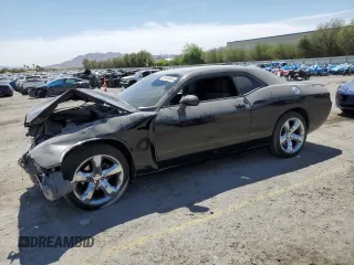 2012 Dodge Challenger SXT Plus z VIN 2C3CDYAG7CH258161, wystawiony jako Copart lot #59049045 z przebiegiem 135 090 mil mil oraz Szkoda całkowita • Salvage title. Historia ofert i sprzedaży dostępna na DreamBid. Obrazek 1.