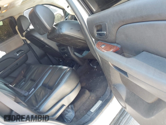 2007 Chevrolet Tahoe LS with VIN 1GNFC13007R310861, listed as a IAAI auction lot 42621401 with 241,291 mi miles and . Bid and sale history available at DreamBid. Image 8.