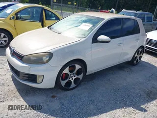 2010 Volkswagen Golf GTI with VIN WVWHV7AJ0AW227692, listed as a IAAI auction lot 42655515 with 144,748 mi miles and . Bid and sale history available at DreamBid. Image 2.