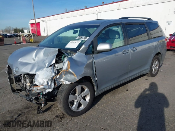 2014 Toyota Sienna LE with VIN 5TDJK3DC4ES088768, listed as a IAAI auction lot 41473251 with 100,512 mi miles and . Bid and sale history available at DreamBid. Image 2.