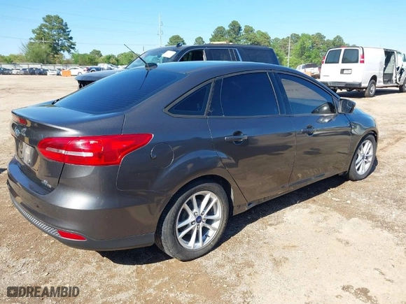 2015 Ford Focus SE with VIN 1FADP3F24FL219760, listed as a IAAI auction lot 41947221 with 163,259 mi miles. Bid and sale history available at carsss.com. Image 4.