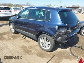 2012 Volkswagen Tiguan S with VIN WVGBV7AX2CW566981, listed as a IAAI auction lot 42069748 with 153,613 mi miles and . Bid and sale history available at DreamBid. Image 3.