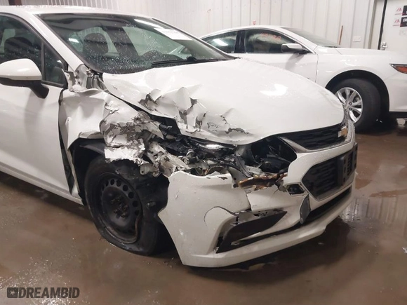 2016 Chevrolet Cruze LS with VIN 1G1BC5SM3G7245060, listed as a IAAI auction lot 41552704 with 140,631 mi miles. Bid and sale history available at carsss.com. Image 6.
