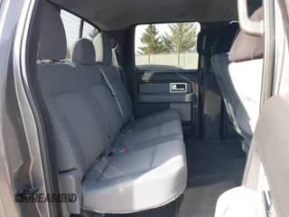 2011 Ford F-150 XLT with VIN 1FTFW1ET7BFC47792, listed as a IAAI auction lot 41765574 with 174,001 mi miles. Bid and sale history available at carsss.com. Image 8.