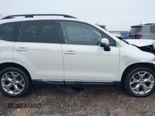 2017 Subaru Forester Touring with VIN JF2SJAWCXHH501702, listed as a IAAI auction lot 42080564 with 188,392 mi miles and . Bid and sale history available at DreamBid. Image 13.