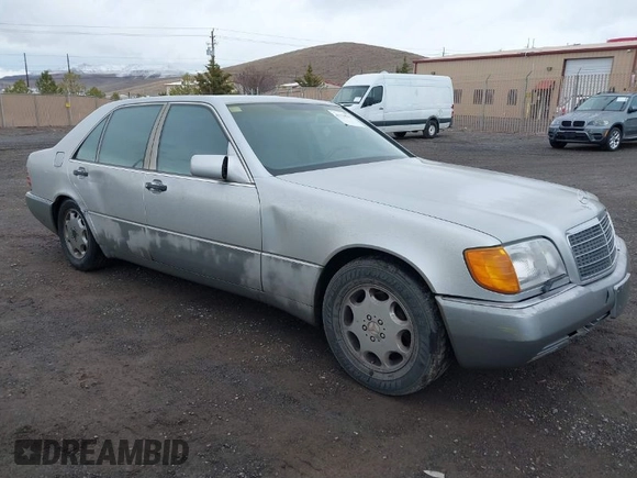 1994 Mercedes-Benz S with VIN WDBGA43E0RA162923, listed as a IAAI auction lot 42012249 with 107,498 mi miles and . Bid and sale history available at DreamBid. Image 1.