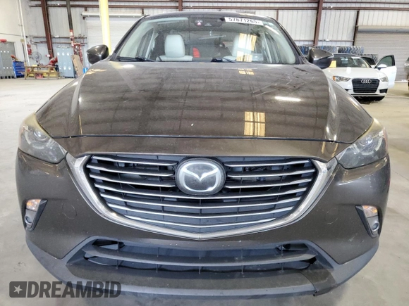 2017 Mazda CX-3 Grand Touring z VIN JM1DKFD74H0163736, wystawiony jako Copart lot #57871265 z przebiegiem 212 515 mil mil oraz Szkody całkowita. Historia ofert i sprzedaży dostępna na DreamBid. Obrazek 5.