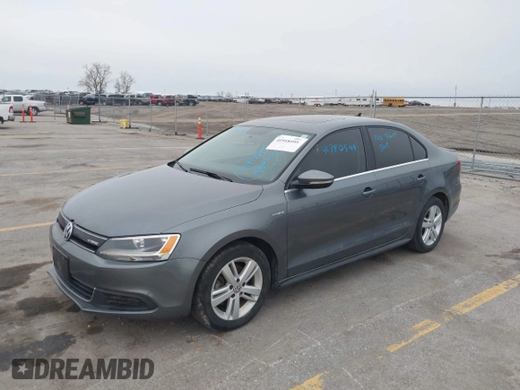 2013 Volkswagen Jetta Sedan Hybrid SE with VIN 3VW637AJ0DM228954, listed as a IAAI auction lot 41918495 with 138,232 mi miles. Bid and sale history available at carsss.com. Image 2.