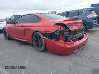2013 BMW M6 z VIN WBSLX9C55DC968497, wystawiony jako IAAI lot #41863884 z przebiegiem 128 241 mil mil oraz . Historia ofert i sprzedaży dostępna na DreamBid. Obrazek 3.