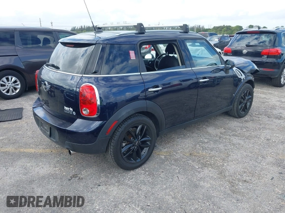 2013 MINI Countryman with VIN WMWZB3C58DWM07817, listed as a IAAI auction lot 41962291 with 60,763 mi miles and . Bid and sale history available at DreamBid. Image 4.
