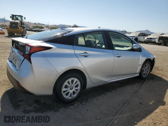 2022 Toyota Prius L Eco с VIN JTDKAMFU1N3177721, выставлен на аукционе Copart как лот 62401865 с пробегом 74 785 миль миль и Списание • Salvage title. История ставок и продаж доступна на DreamBid. Изображение 3.