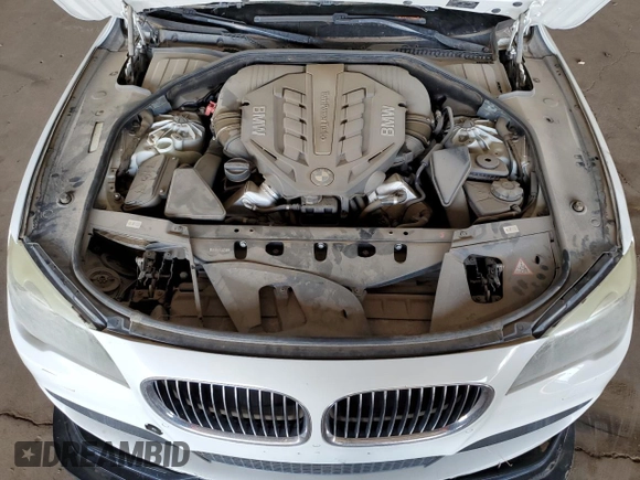 2012 BMW 7 Series 750Li с VIN WBAKB8C59CC852419, выставлен на аукционе Copart как лот 53736305 с пробегом 150 224 миль миль и Списание • Salvage title. История ставок и продаж доступна на DreamBid. Изображение 11.