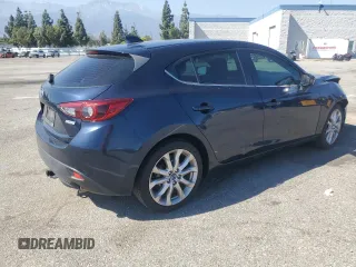 2014 Mazda 3 S Touring with VIN JM1BM1L31E1162990, listed as a Copart auction lot 51667034 with 92,255 mi miles and Salvage Title. Bid and sale history available at DreamBid. Image 3.