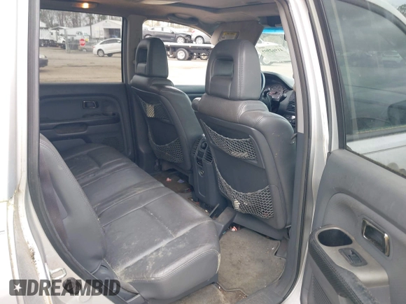 2005 Honda Pilot EX-L z VIN 5FNYF18695B018134, wystawiony jako IAAI lot #41962595 z przebiegiem 264 599 mil mil oraz . Historia ofert i sprzedaży dostępna na DreamBid. Obrazek 8.