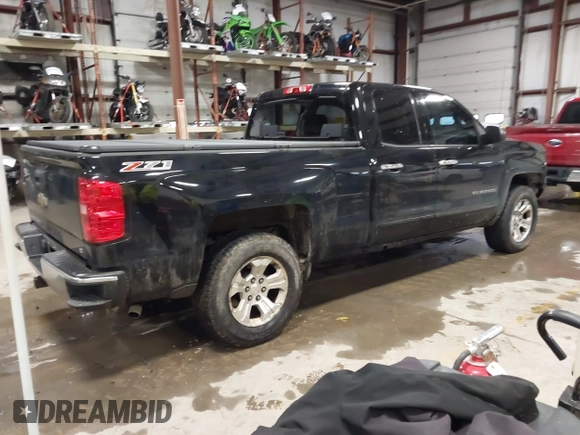 2015 Chevrolet Silverado 1500 LT with VIN 1GCVKREC1FZ186563, listed as a IAAI auction lot 41089120 with 156,261 mi miles. Bid and sale history available at carsss.com. Image 4.
