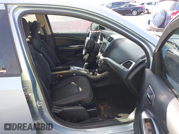2013 Dodge Journey SXT with VIN 3C4PDCBG4DT584135, listed as a IAAI auction lot 41902149 with 165,700 mi miles and . Bid and sale history available at carsss.com. Image 5.