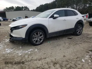 2020 Mazda CX-30 Premium with VIN 3MVDMBEM9LM111028, listed as a Copart auction lot 88911655 with 77,799 mi miles and Salvage title. Bid and sale history available at DreamBid. Image 1.