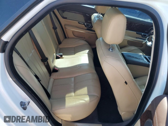 2015 Jaguar XJ with VIN SAJWA1CZ8F8V81637, listed as a Copart auction lot 55619555 with 88,328 mi miles and Salvage Title. Bid and sale history available at DreamBid. Image 10.