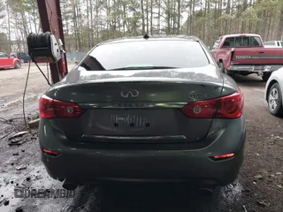 2015 Infiniti Q50 Premium z VIN JN1BV7ARXFM411040, wystawiony jako IAAI lot #41706295 z przebiegiem 97 297 mil mil oraz . Historia ofert i sprzedaży dostępna na DreamBid. Obrazek 16.
