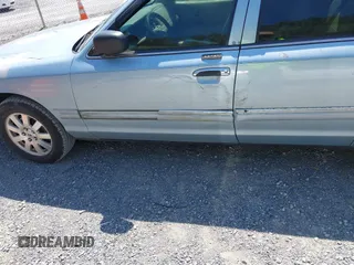 2007 Ford Crown Victoria LX z VIN 2FAFP74V37X122518, wystawiony jako IAAI lot #42071004 z przebiegiem 228 547 mil mil oraz . Historia ofert i sprzedaży dostępna na DreamBid. Obrazek 18.