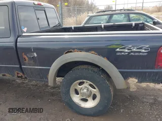 2001 Ford Ranger XL Fleet z VIN 1FTZR15E11PB68777, wystawiony jako IAAI lot #41673554 z przebiegiem 185 621 mil mil oraz . Historia ofert i sprzedaży dostępna na DreamBid. Obrazek 6.