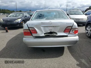 2001 Mercedes-Benz E-Class AWD with VIN WDBJF83J01X047817, listed as a Copart auction lot 71675084 with 143,127 mi miles and Salvage Title. Bid and sale history available at carsss.com. Image 6.