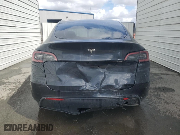 2024 Tesla Model Y with VIN 7SAYGDED4RF017614, listed as a Copart auction lot 45754675 with 11,209 mi miles and Salvage title. Bid and sale history available at DreamBid. Image 6.