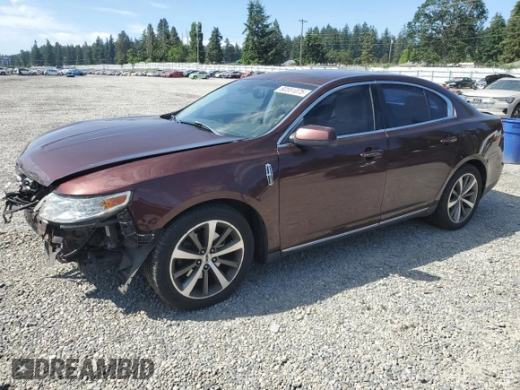 2009 Lincoln MKS z VIN 1LNHM94R89G601127, wystawiony jako Copart lot #60551075 z przebiegiem 102 000 mil mil oraz Szkoda całkowita • Salvage title. Historia ofert i sprzedaży dostępna na DreamBid. Obrazek 1.