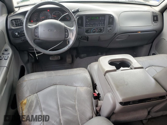 2000 Ford F-150 XL with VIN 1FTRX17L7YNC24292, listed as a Copart auction lot 58852925 with 213,318 mi miles and Salvage title. Bid and sale history available at DreamBid. Image 8.