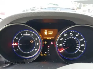 2009 Acura MDX with VIN 2HNYD28219H518971, listed as a IAAI auction lot 40872524 with 205,016 mi miles. Bid and sale history available at carsss.com. Image 7.