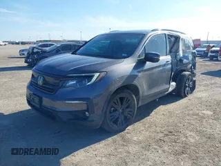 2021 Honda Pilot Special Edition with VIN 5FNYF5H27MB040801, listed as a IAAI auction lot 41656669 with 54,764 mi miles and . Bid and sale history available at DreamBid. Image 2.