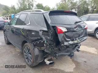 2020 Chevrolet Equinox LT with VIN 2GNAXLEX0L6174015, listed as a IAAI auction lot 41900966 with 144,116 mi miles. Bid and sale history available at carsss.com. Image 3.