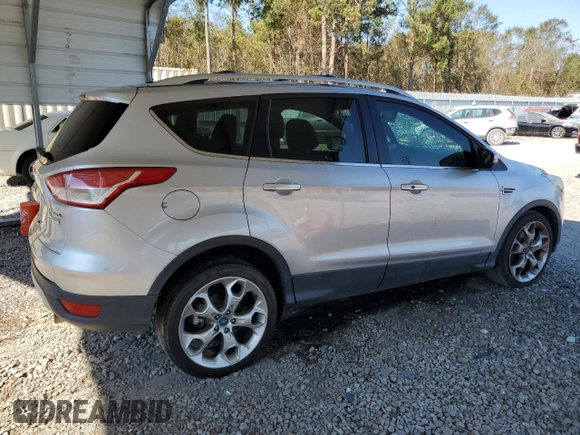 2013 Ford Escape Titanium с VIN 1FMCU0J96DUB25142, выставлен на аукционе Copart как лот 75759094 с пробегом 167 809 миль миль и Списание • Salvage title. История ставок и продаж доступна на DreamBid. Изображение 3.
