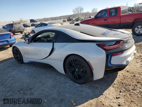 2015 BMW i8 z VIN WBY2Z2C51FV392594, wystawiony jako Copart lot #42561715 z przebiegiem Nie podano mil oraz Szkoda całkowita • Salvage title. Historia ofert i sprzedaży dostępna na DreamBid. Obrazek 2.