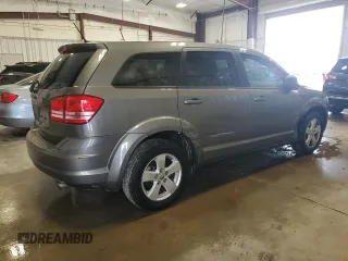 2013 Dodge Journey American Value with VIN 3C4PDCAB8DT509251, listed as a Copart auction lot 53996125 with 112,041 mi miles and Non Repairable. Bid and sale history available at DreamBid. Image 3.