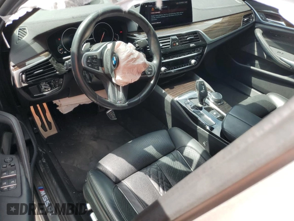 2019 BMW 5 Series M550i xDrive with VIN WBAJB9C53KB464902, listed as a Copart auction lot 54252875 with 45,157 mi miles and Salvage title. Bid and sale history available at DreamBid. Image 8.